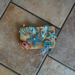 Blue seahorse clutch