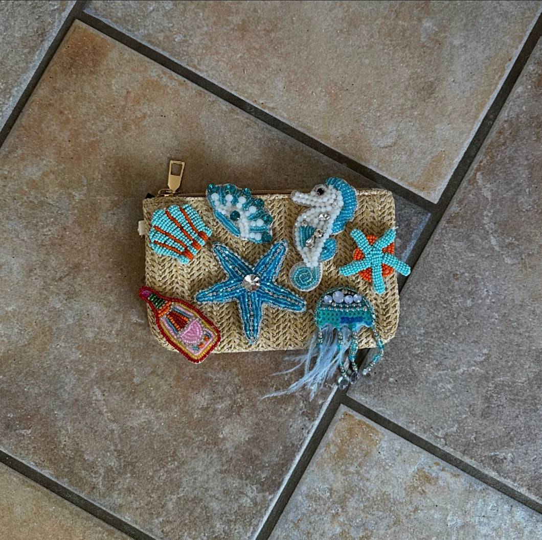 Blue seahorse clutch